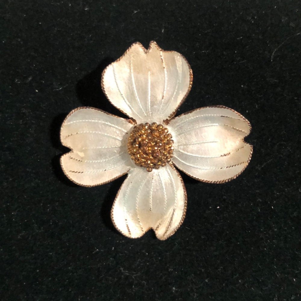 Brooch.